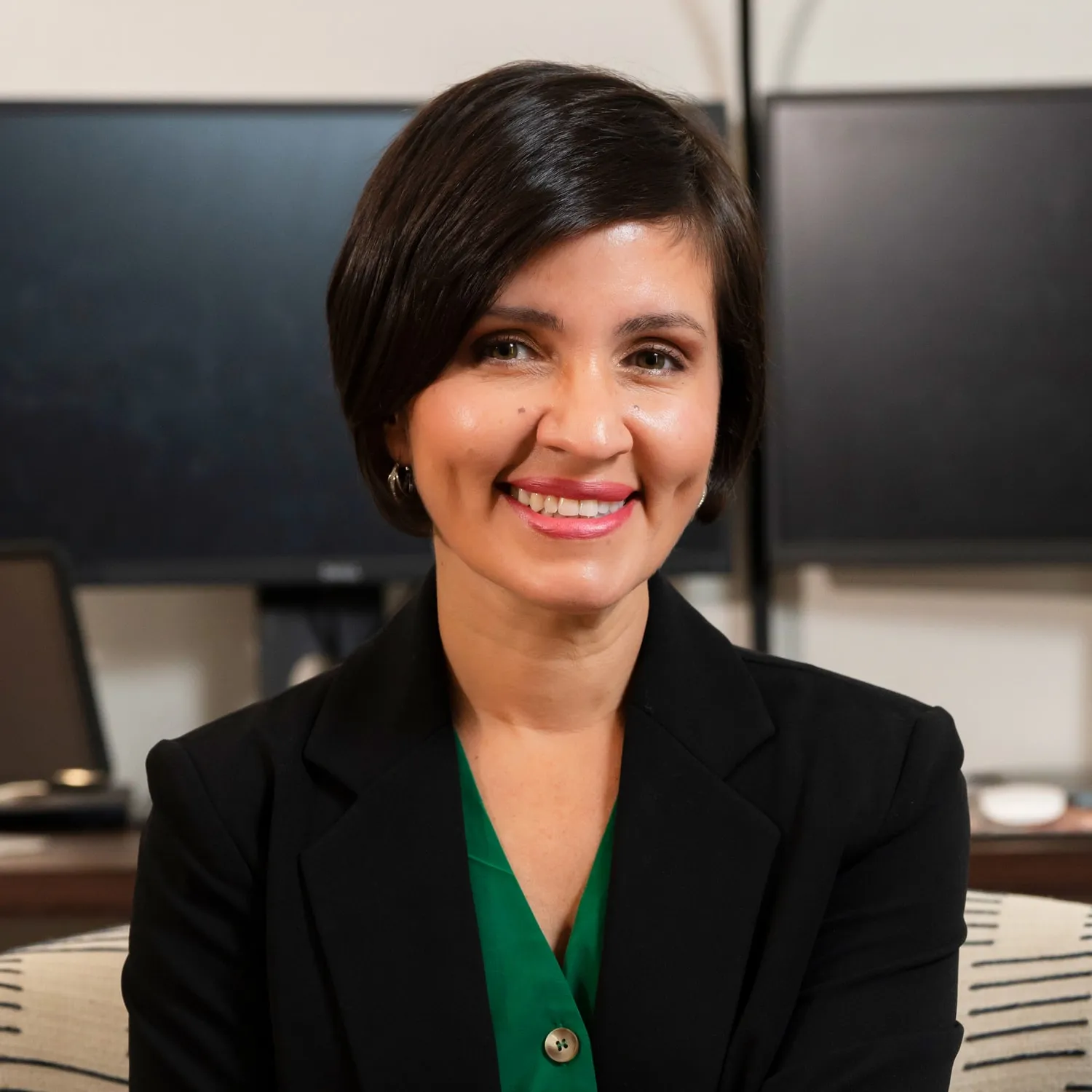 Johanna Zayas, founder of Zacosta Bookkeeping, in a professional headshot.